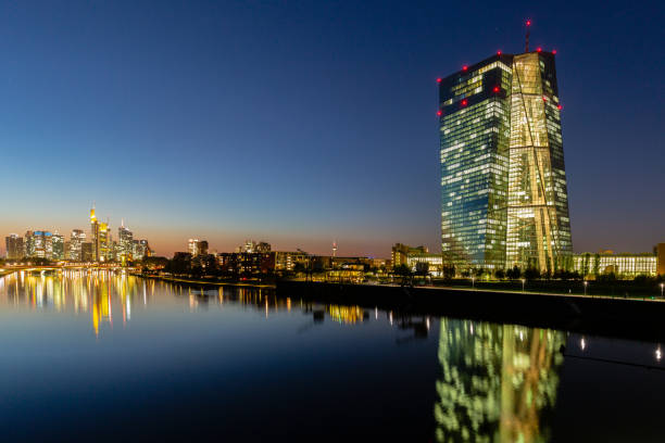 Frankfurt European Central Bank Tower, river Main and skyline at night