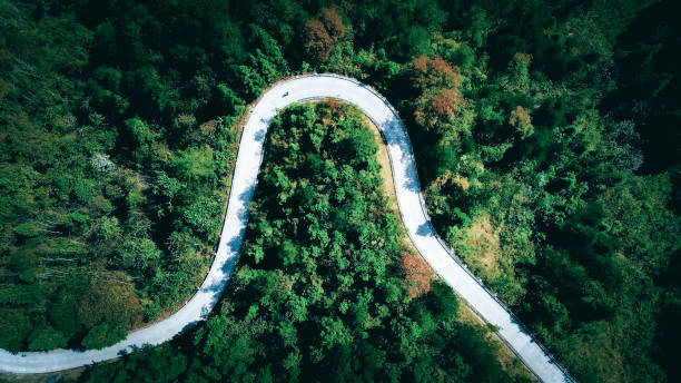 istock Winding Road In Mountains 1053927846