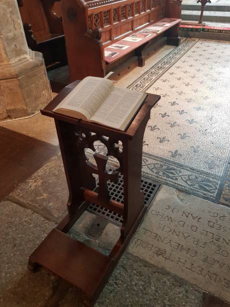 istock Prayer book inside English church. 1053928092