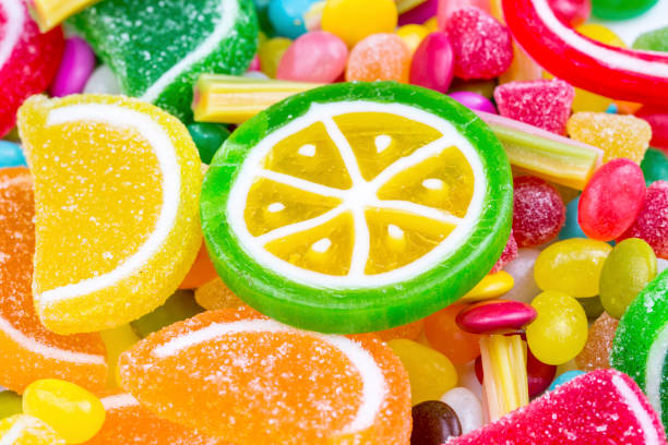 colorful lollipops and different colored round candy. top view. - 11305 imagens e fotografias de stock