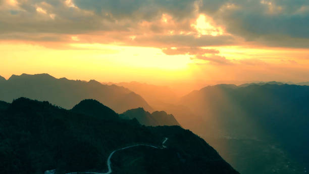 istock Aerial view landscape of mountains sunset 1053928398