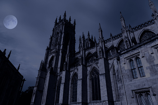 View of York Minster, England, the largest Gothic minster in Europe north of the Alps.Moonlit night view of York Minster, England, the largest Gothic minster in Europe north of the Alps.