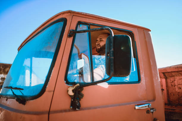 Bearded Truck Driver With Open Window