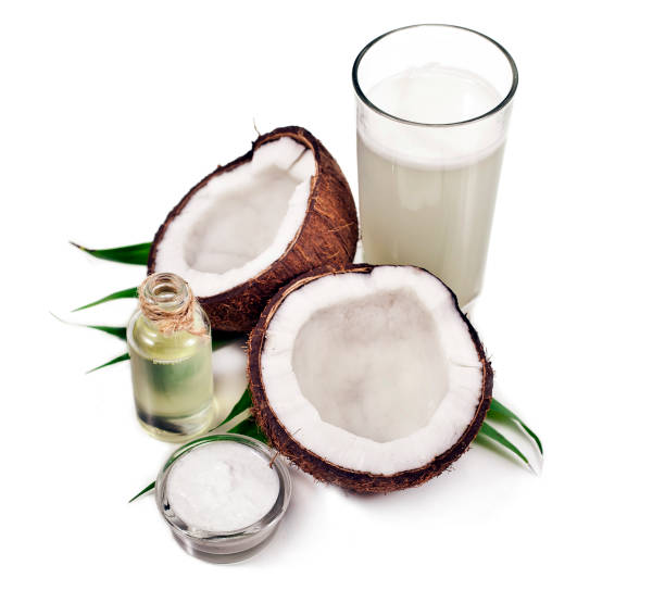 istock Coconut with coconut milk, oil and coconut meat. 1053938568