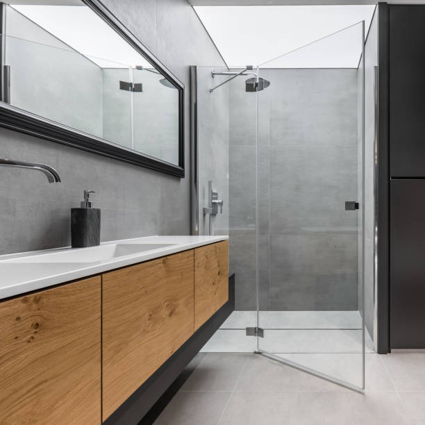 istock Bathroom with cabinet and shower 1053943064