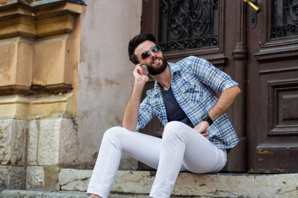 istock Casual Guy With The Phone 1053949180