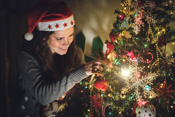 istock Cute girl next to a Christmas tree 1053955184
