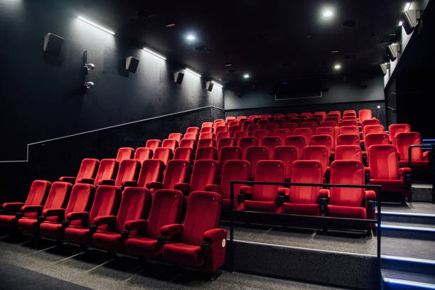 Empty rows of red seats Empty cinema right before the movie premiere concert hall photos stock pictures, royalty-free photos & images