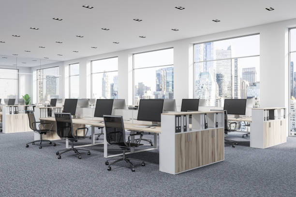 istock Panoramic company office cubicles, wood 1053967194