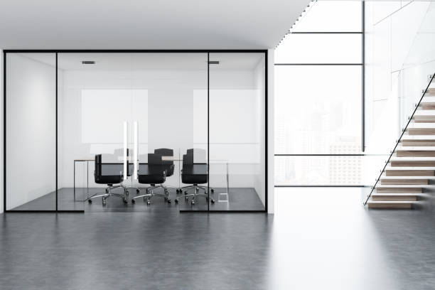 istock White and black meeting room interior 1053967584