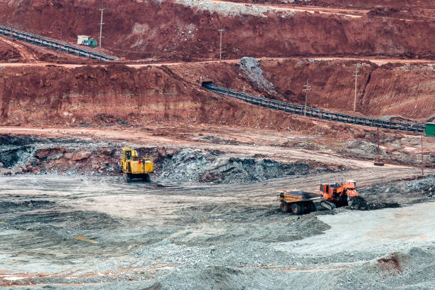 istock Part of a pit with big mining truck working 1053969322