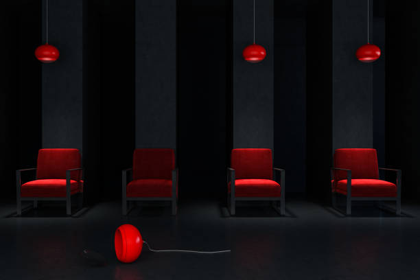 istock Red armchairs in a black room 1053969640