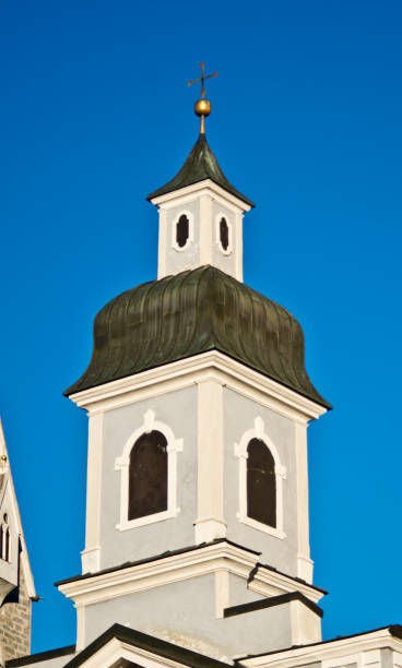istock typical bell tower of the european mountains 1053972704