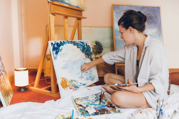 istock Woman painter working on her art 1053975092
