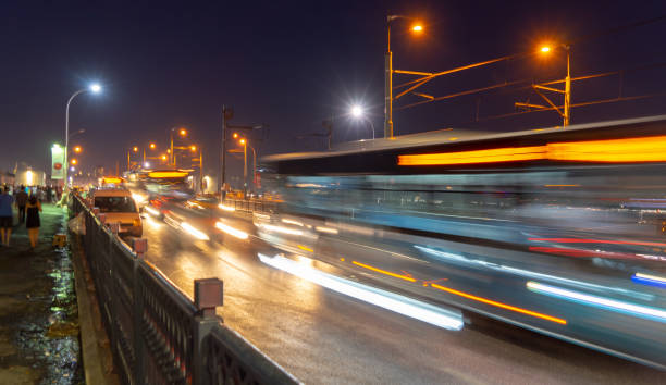 istock Night shot with strong intentional motion blur from traffic over a bridge in Turkey. 1053975774