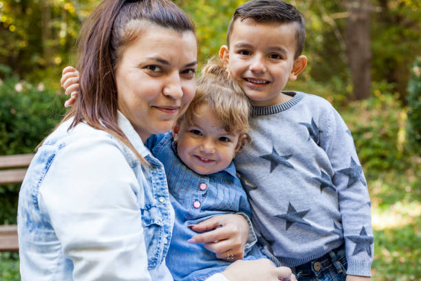 istock mother with children 1053976974