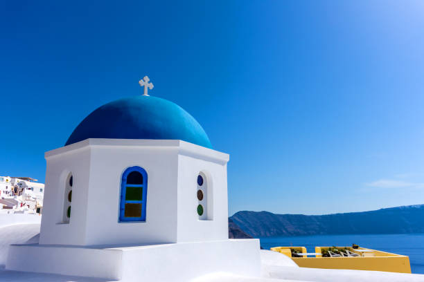 istock Santorini, Greece.Church detail on cliff 1053977116