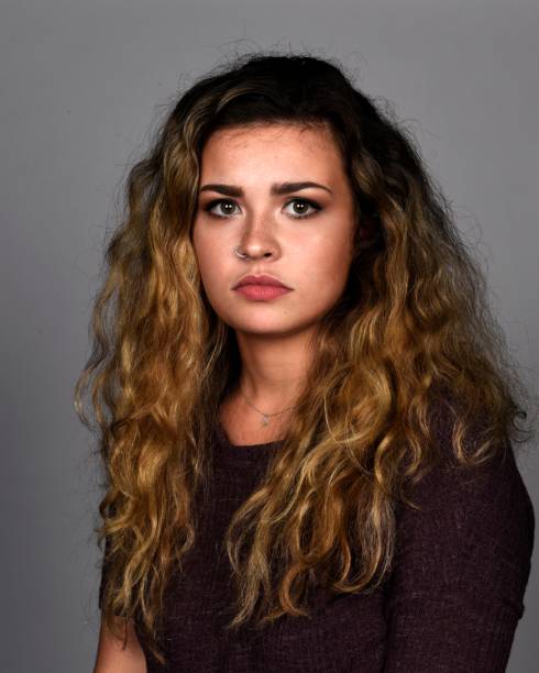 istock Young woman, beautiful, portrait, studio 1053977140