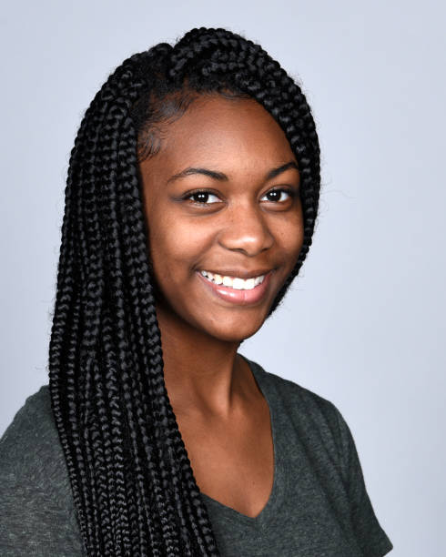 istock Beautiful young woman, portrait, studio 1053977210