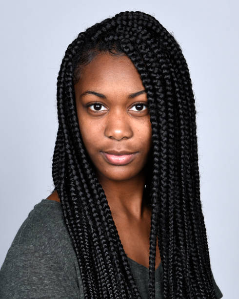 istock Beautiful young woman, portrait, studio 1053977248