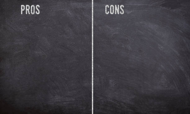 pros and cons chalk written text on a black board white text