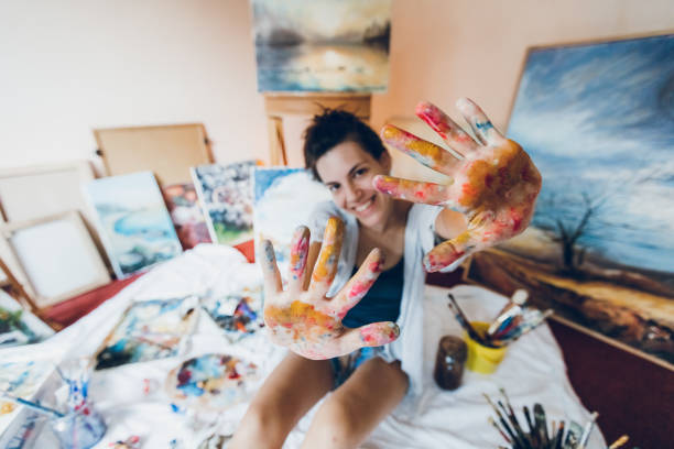 istock Woman painter with her art 1053977926