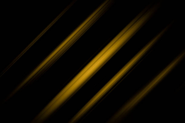 istock Gold background black background background image with diagonal light black and white. 1053979252