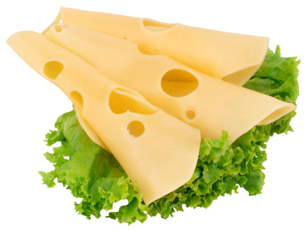 istock cheese slices and fresh green lettuce isolated on a white background 1053979840