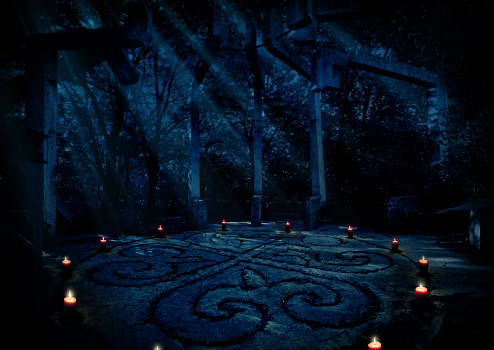 Old paganist temple in night forest