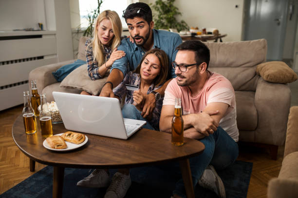 istock Friends shopping online 1053986758