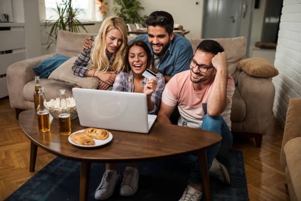 istock Friends shopping online 1053986766