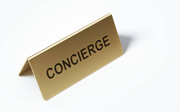 istock Brass Concierge Sign Standing On  White Background 1053986918