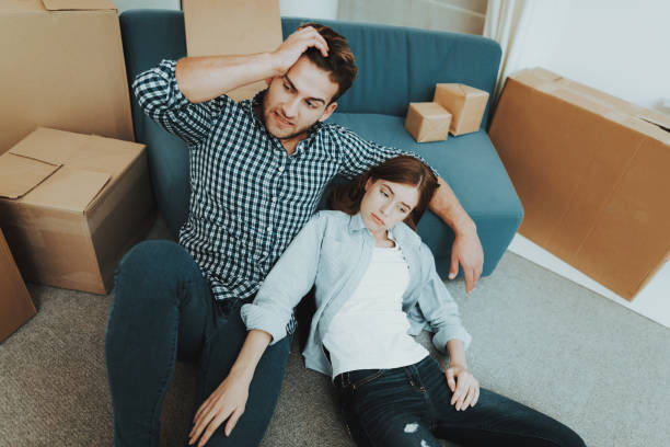 istock Young Couple During A Move To A New Apartment. 1053987114