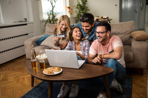 istock Friends shopping online 1053987184