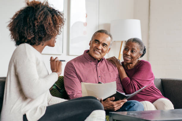 Senior couple getting advice at home