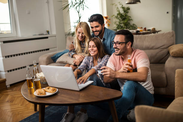 istock Friends shopping online 1053987470