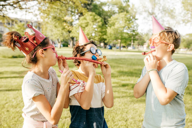 istock Kids having fun on birthday party 1053987554