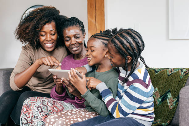 istock Family photos scrolling on tablet 1053987582