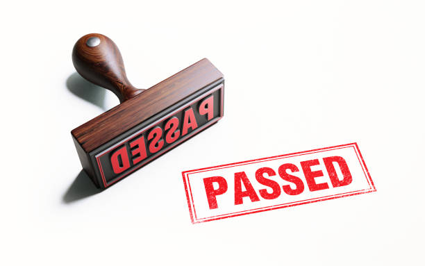 istock Wooden Passed Stamp On White Background 1053989690
