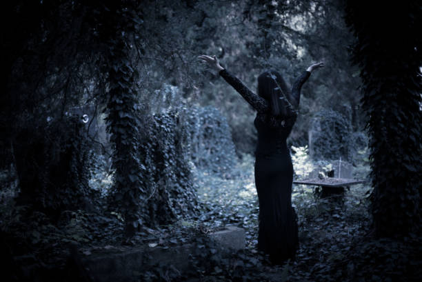 istock Goth girl in cemetery 1053990530