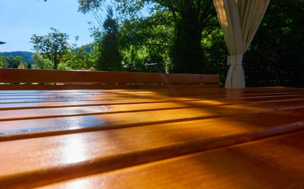 istock Table in a green garden 1053991882