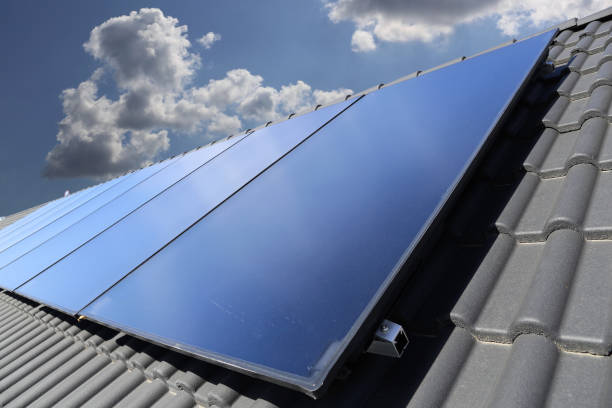 istock Photovoltaic: Roof with solar panels 1053993740