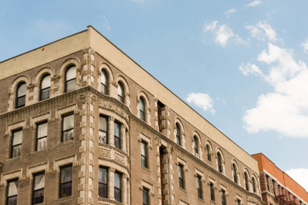istock Classic NYC Apartment Building with Blue Sky in Harlem 1053994272