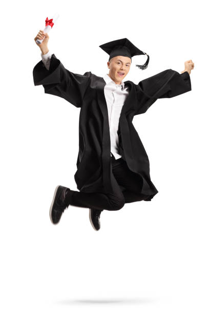 istock Overjoyed graduate student with a diploma jumping 1053994800