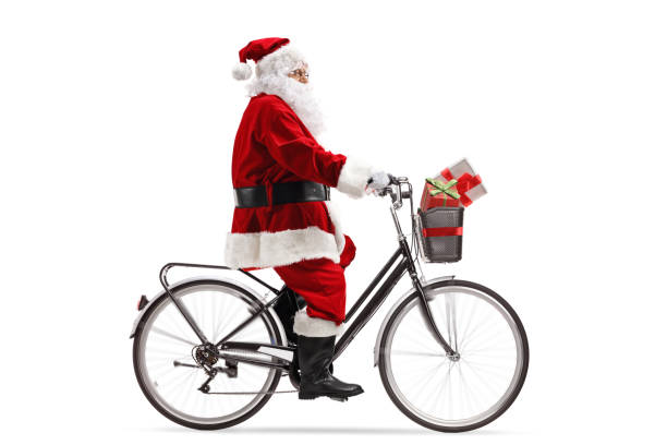 санта-клаус верхом на велосипеде - bicycle isolated basket red стоковые фото и изображения