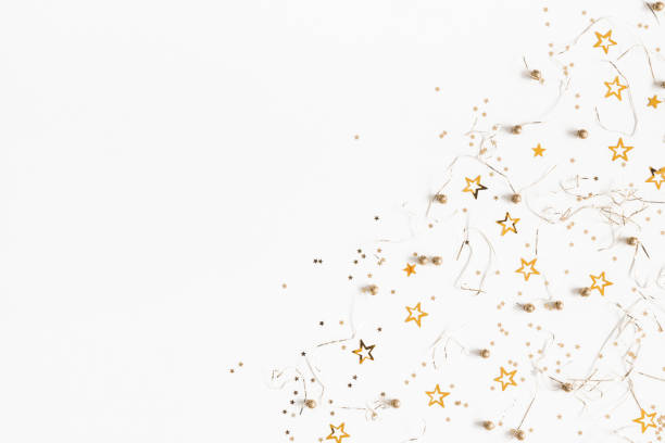 istock Christmas composition. Christmas golden decorations on white background. Flat lay, top view, copy space 1054001674