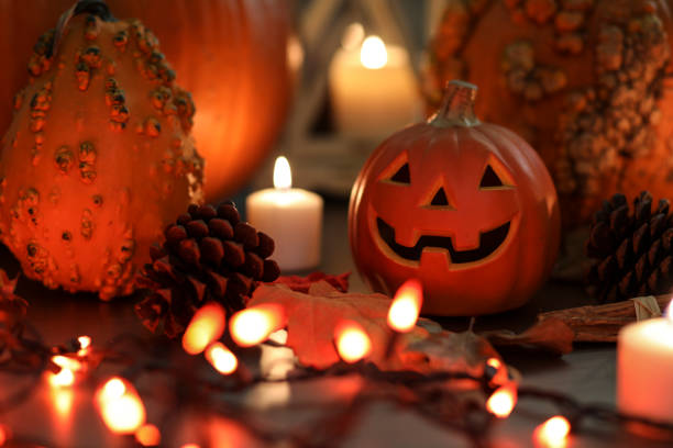 istock Halloween, autumn scene with pumpkins and candles. 1054003326