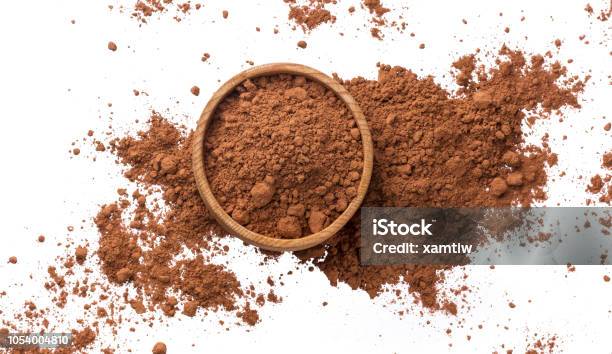 Pile Of Cocoa Powder Isolated On White Background Top View Stock Photo - Download Image Now