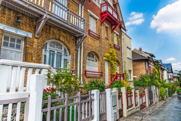 istock Picturesque houses on a cloudy day in Paris 1054006362