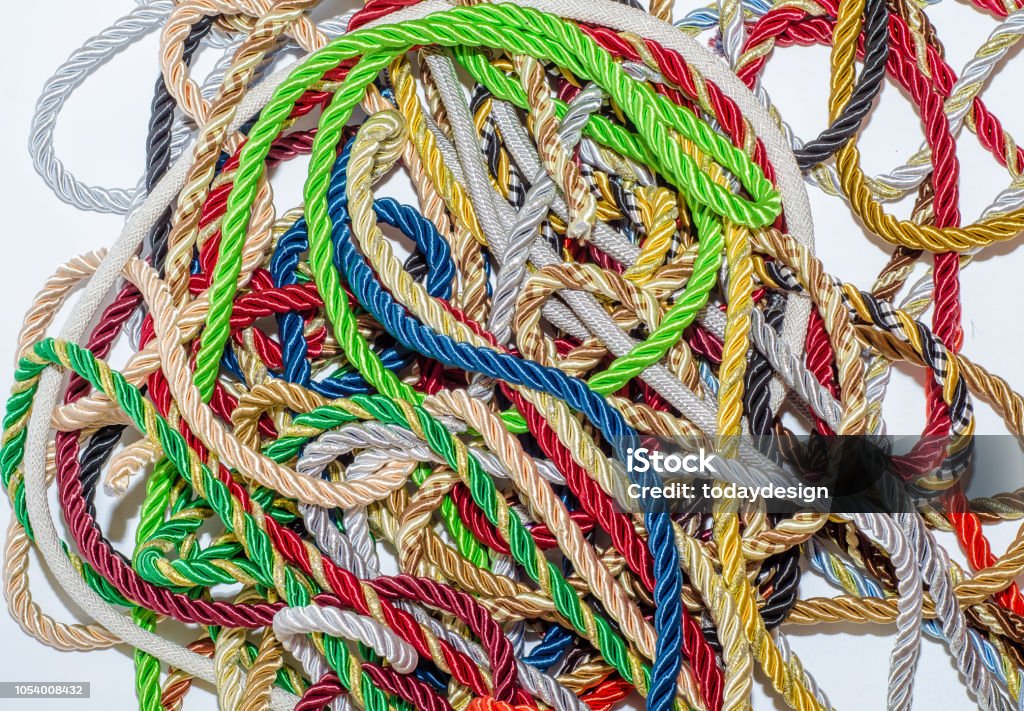 Multicolored Decorative Rope Scattered In A Mess Textile Manufacture  Threads Decor Stock Photo - Download Image Now - iStock